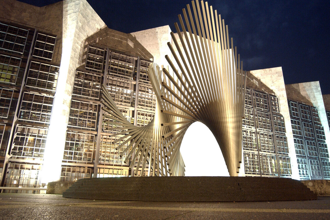 Sculpture in front of the town hall at night