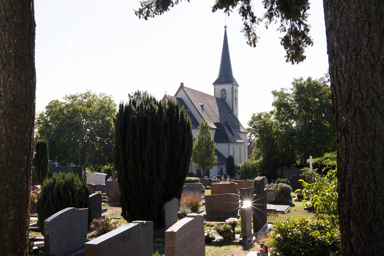 In the shadow of the church: the cemetery in Ebersheim.
